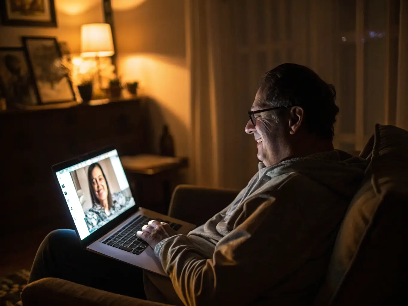 A person smiling and participating in a video call with a therapist, showcasing the ease and accessibility of online mental health consultations.
